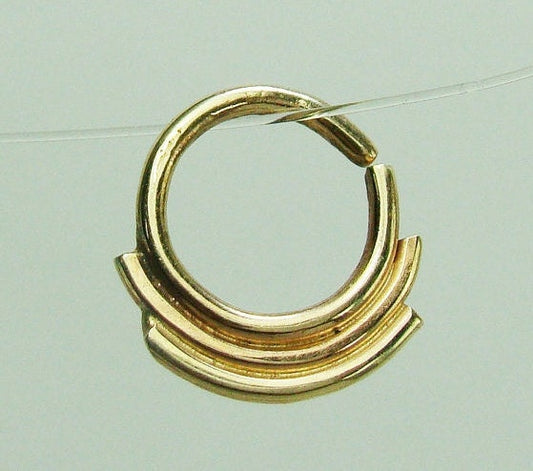 Men Gold septum piercing