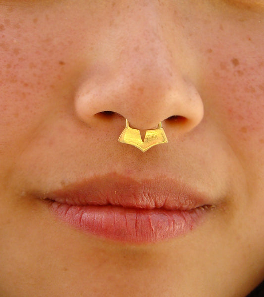 Geometric gold piercing
