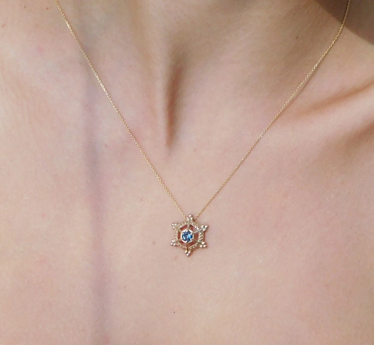 Blue Topaz 14 k gold Snowflake necklace