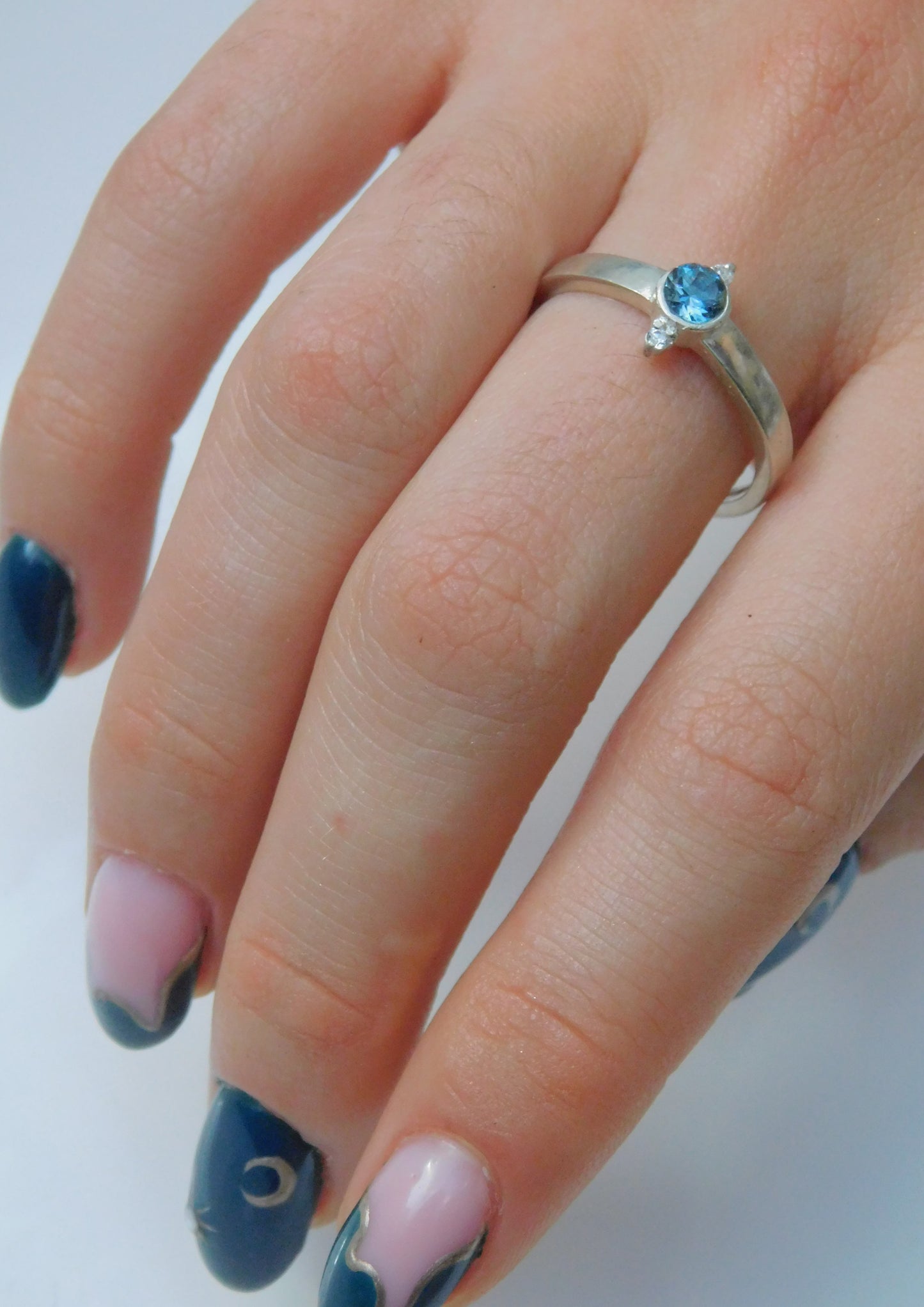 Blue Topaz silver engagement ring with diamonds