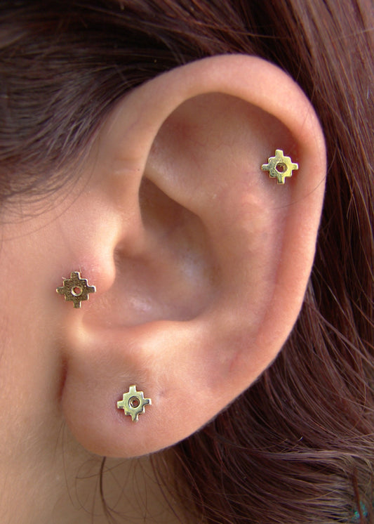 Gold stud earrings