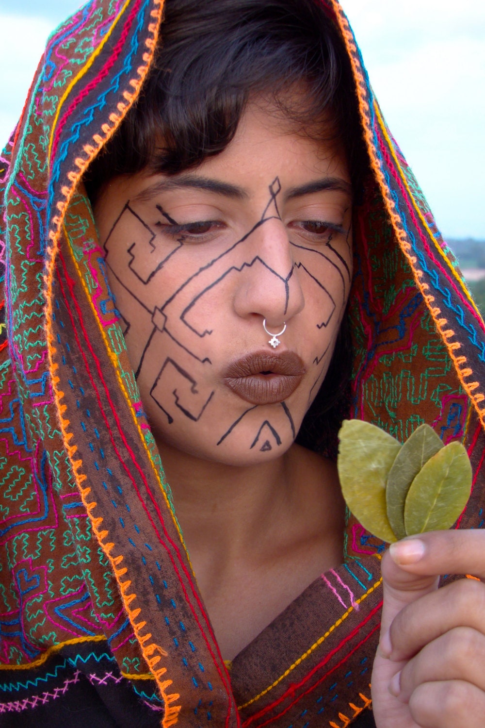 Tribal septum ring, Inca cross