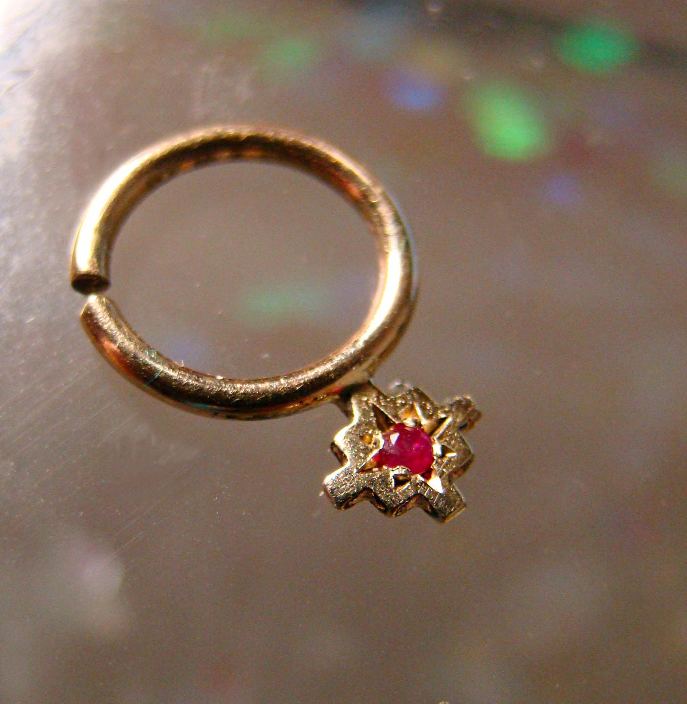 Gold and Ruby Chakana Septum ring