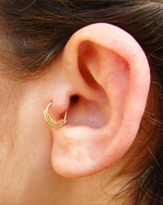 Gold tribal tragus