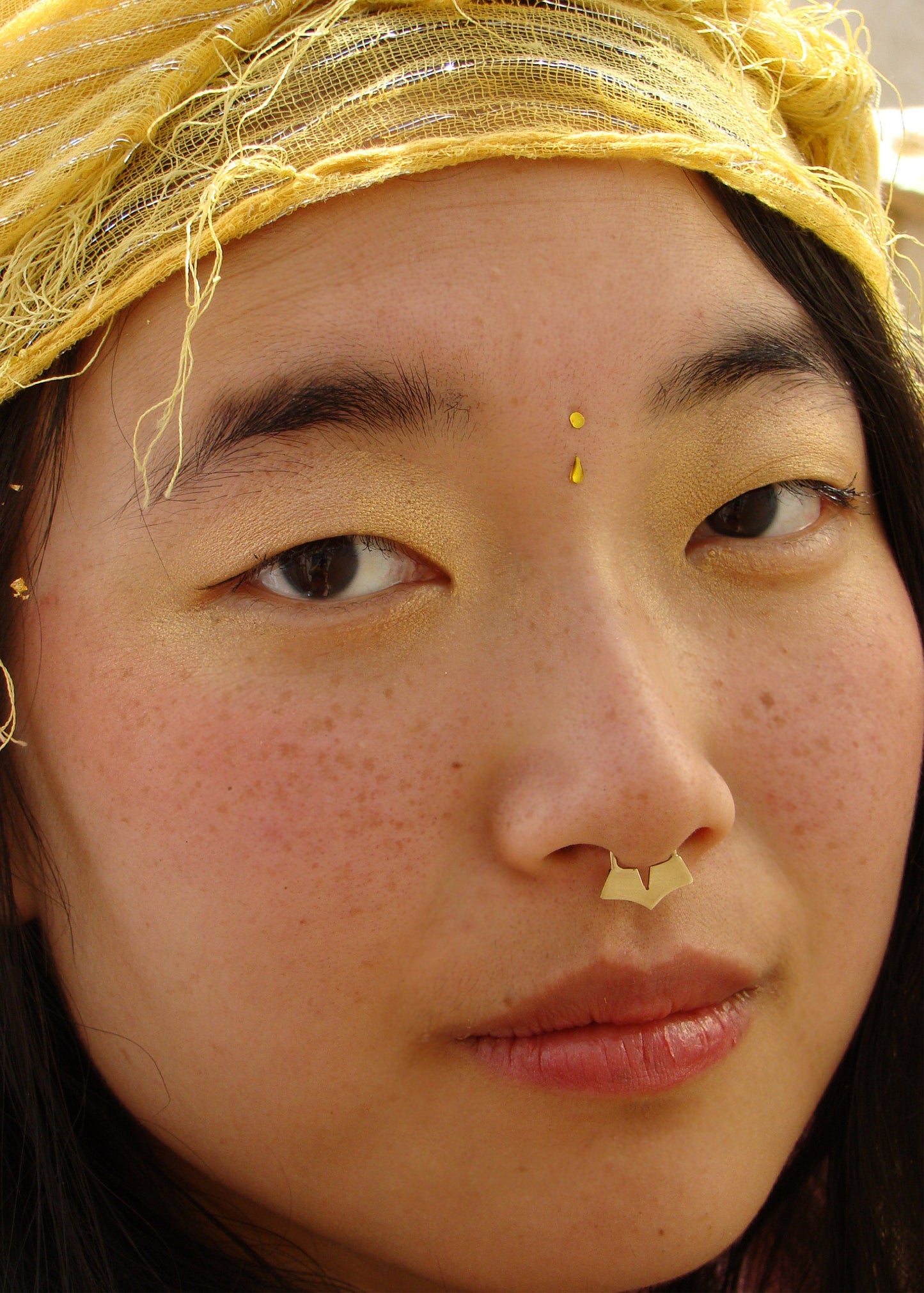 Geometric gold piercing