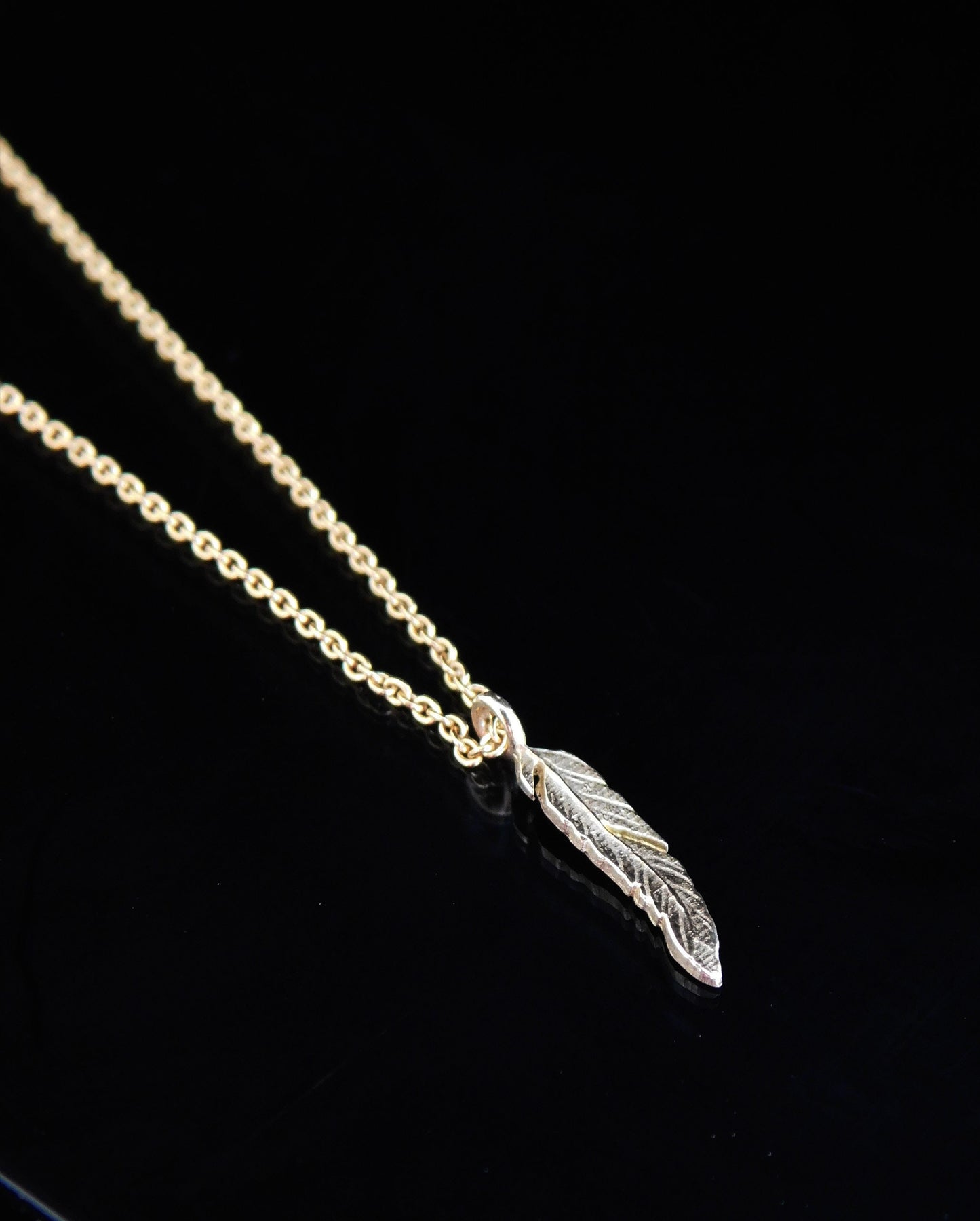 14 k Gold feather necklace