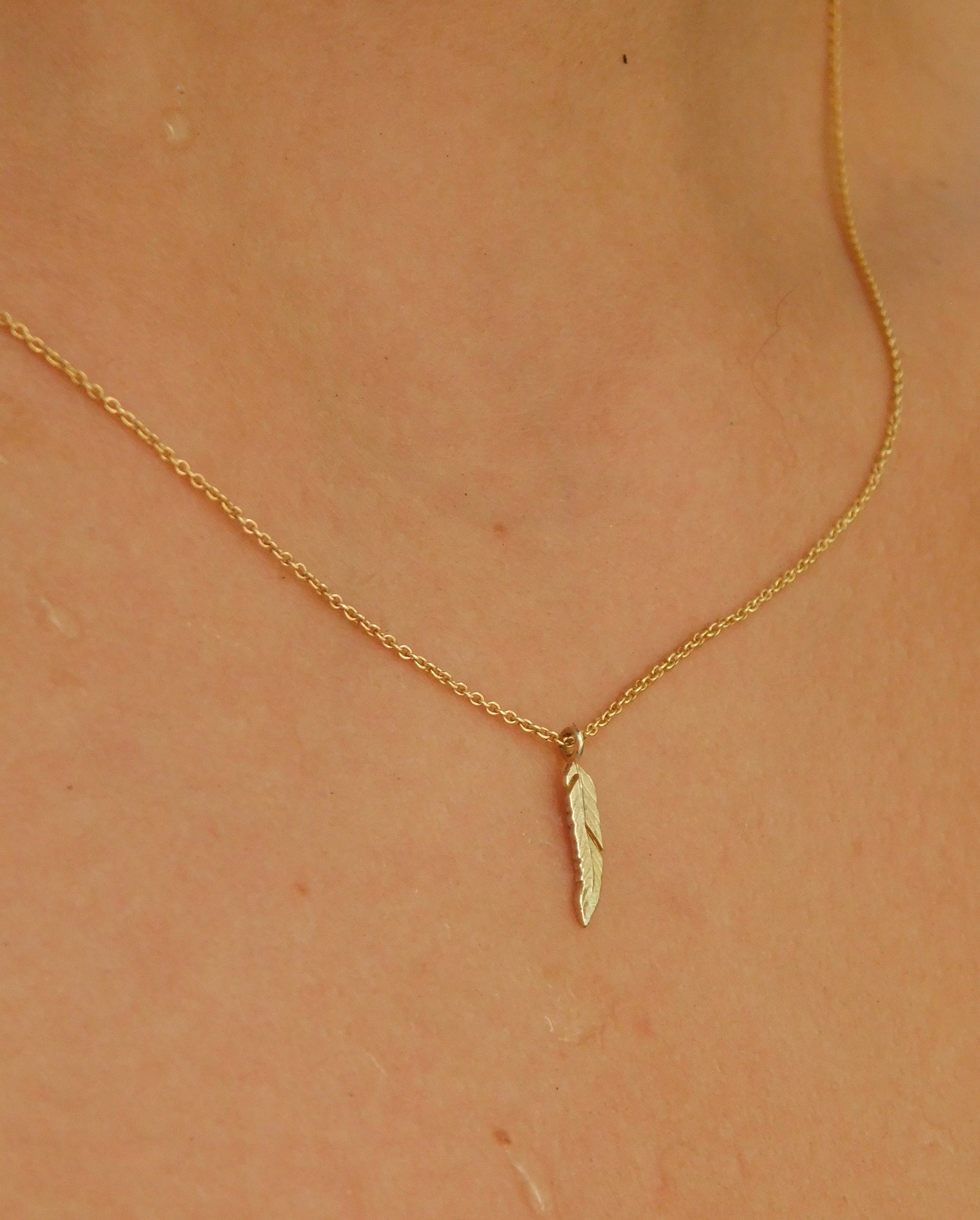 14 k Gold feather necklace