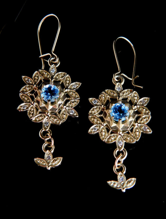 Blue Topaz and diamond 14 k gold Snowflake earrings