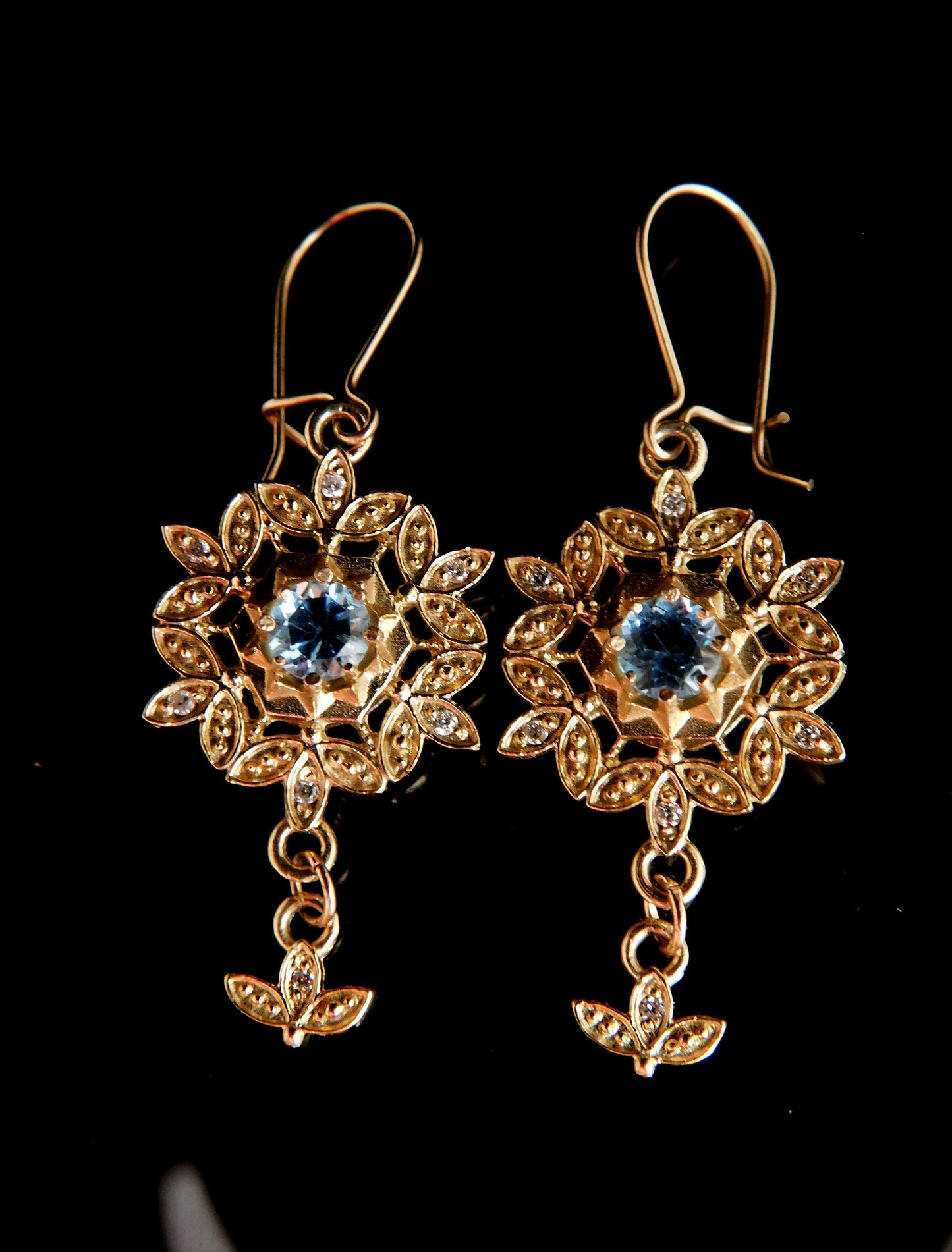 Blue Topaz and diamond 14 k gold Snowflake earrings