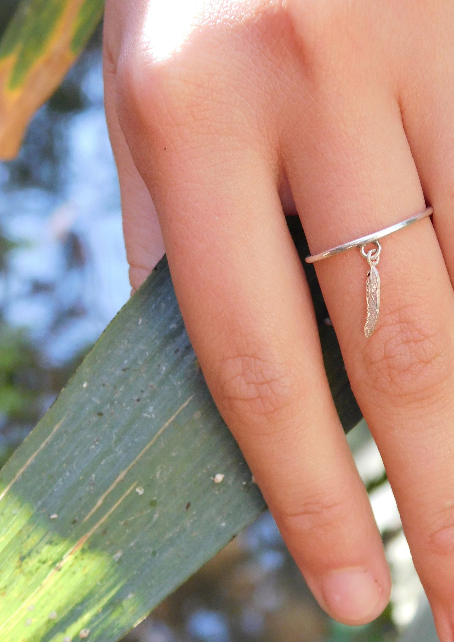 feather dangle silver ring