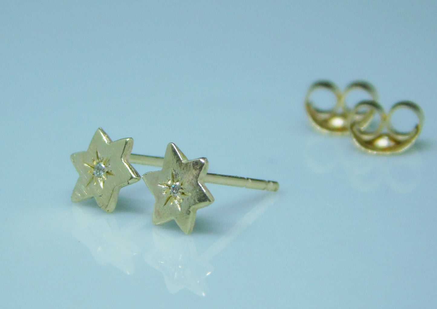 Star of David gold and diamond earrings