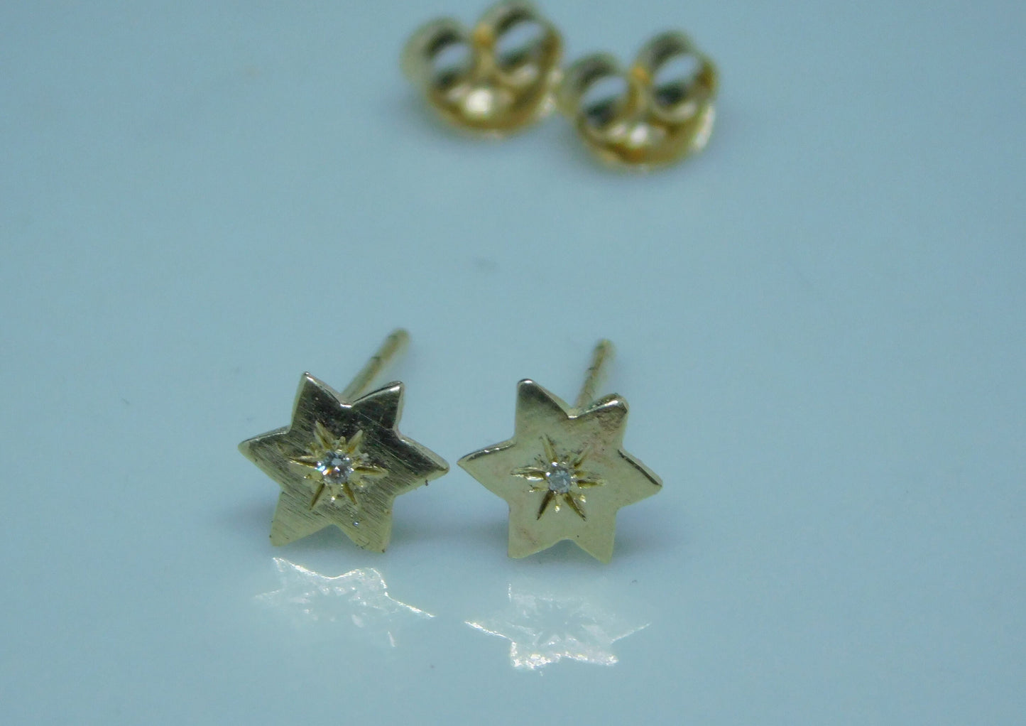 Star of David gold and diamond earrings