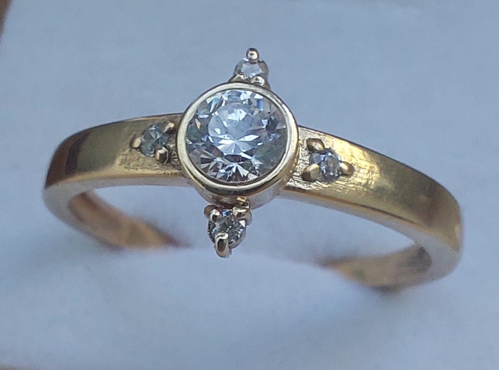 Classic engagement Gold ring with Aquamarine and diamonds