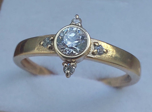 Classic engagement Gold ring with Aquamarine and diamonds