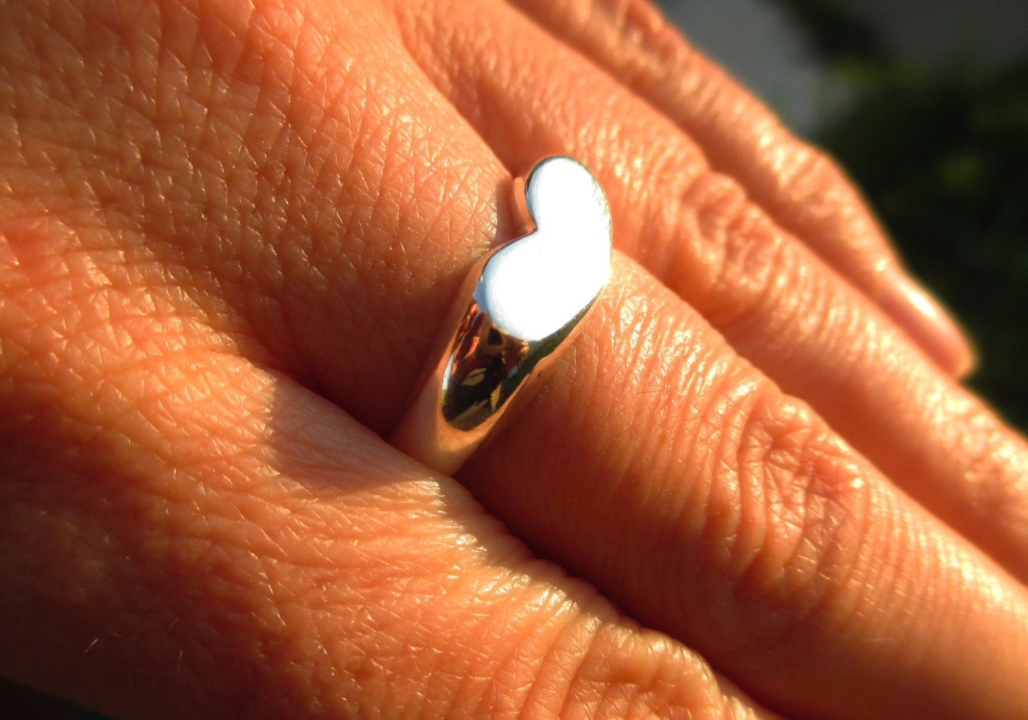 Heart ring with a diamond