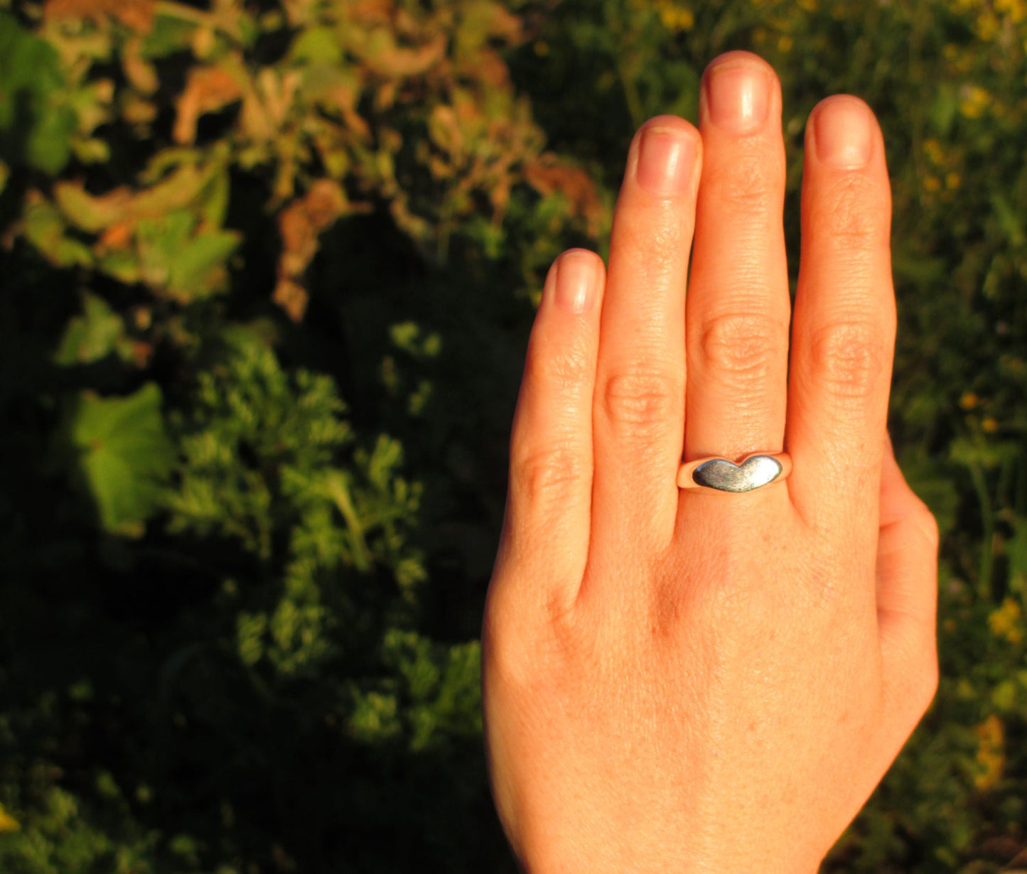 Heart ring with a diamond