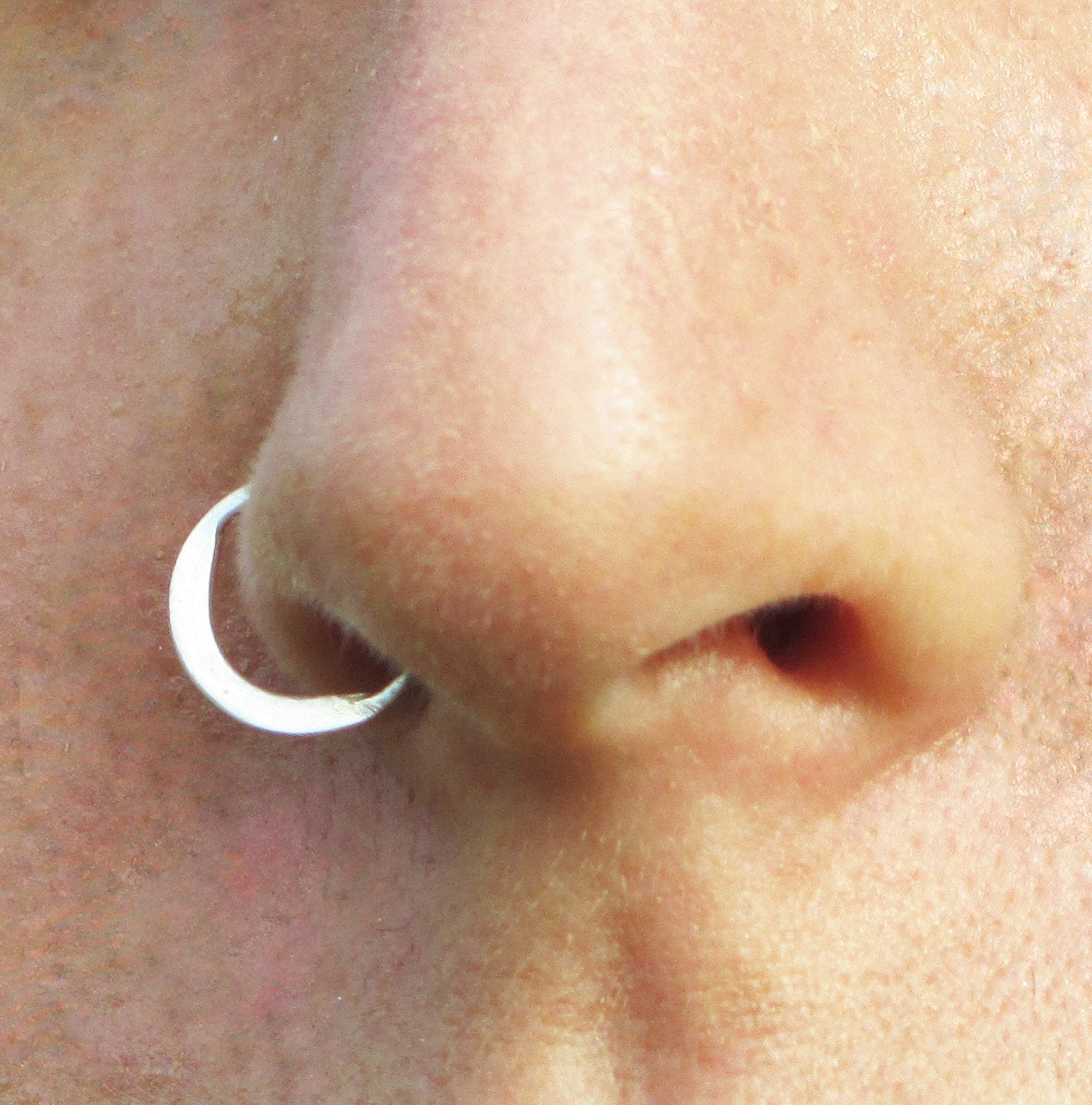 White gold moon septum piercing. 14 karat gold.  Free nickel alergy