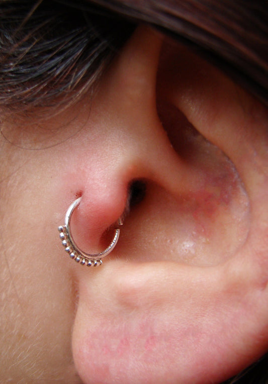 Silver helix piercing